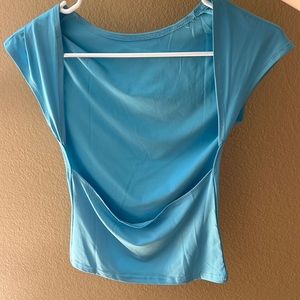 Light blue backless crop top.